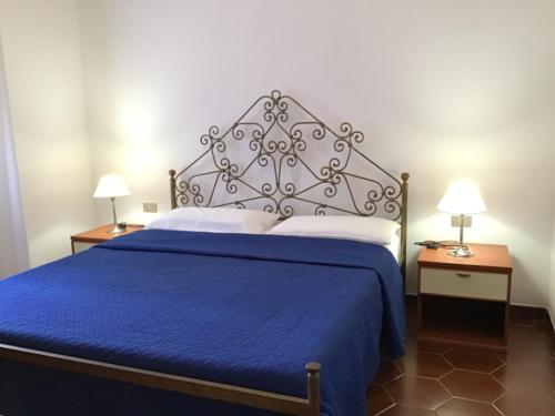 Postel nebo postele na pokoji v ubytování La Cuppulata