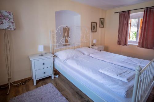 Postel nebo postele na pokoji v ubytování Casa Paulini
