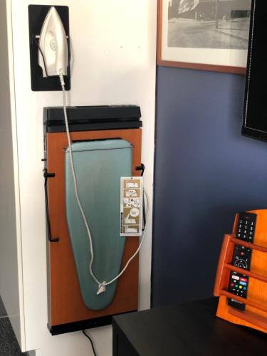 a telephone is plugged into a fax machine at West Side Hotel in Turku