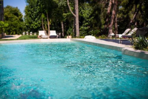 Kolam renang di atau dekat dengan Villa Rosa Resort