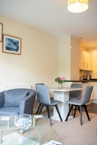 a living room with a couch and chairs and a table at No6 Nursery Convent in Mansfield