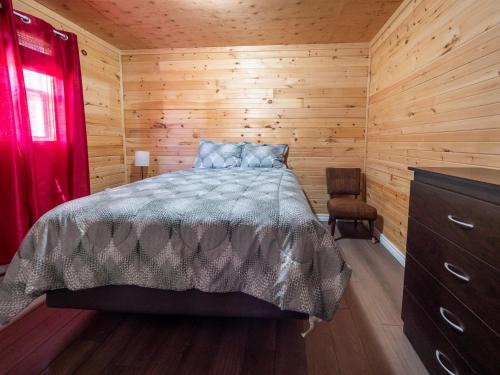 Postel nebo postele na pokoji v ubytování Tracadie Cottages