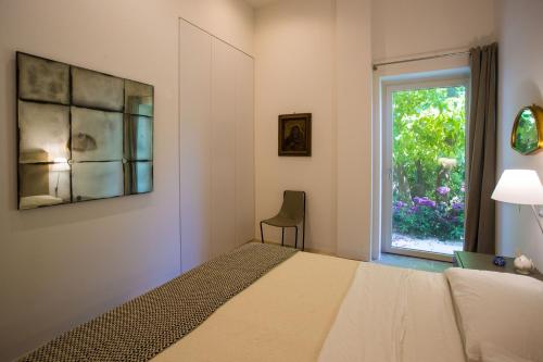 Katil atau katil-katil dalam bilik di Villa Rosa Resort