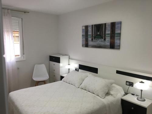 En eller flere senge i et værelse på VUT Santa Marta