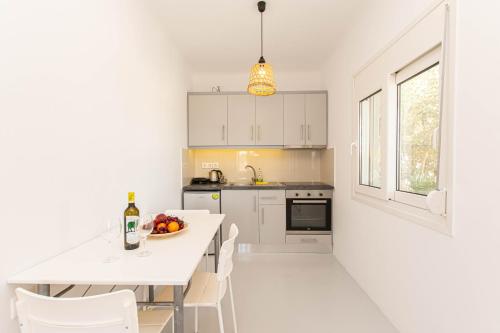 Η κουζίνα ή μικρή κουζίνα στο Overview Mykonos Apartments