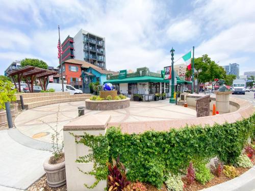 a town square with a fountain and a building at ITH San Diego Adventure Hostel in San Diego