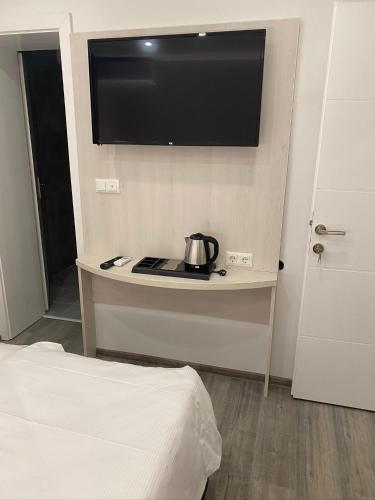 En eller flere senge i et værelse på DM Sobe