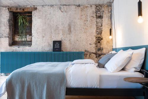 Postel nebo postele na pokoji v ubytování TREMONDI - Boutique BnB