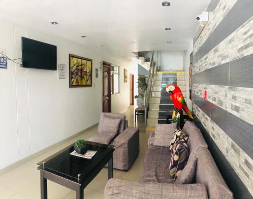 TV a/nebo společenská místnost v ubytování Hotel Casa de Turistas