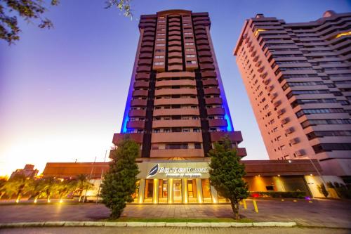 a tall building with two tall buildings at Blue Tree Towers Millenium Porto Alegre in Porto Alegre