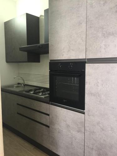 Kuchyň nebo kuchyňský kout v ubytování Le residenze del mare n6