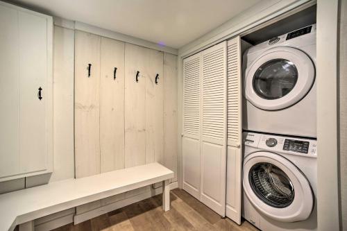 a laundry room with a washer and dryer at Sleek Cabin with Deck, 8 Miles to Mount Snow and Hikes in Wilmington