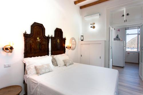 Ένα ή περισσότερα κρεβάτια σε δωμάτιο στο Villa Agrumeto