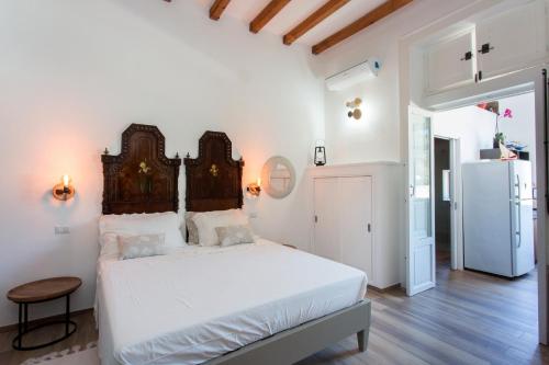 Giường trong phòng chung tại Villa Agrumeto