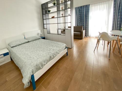 Posteľ alebo postele v izbe v ubytovaní Appartamento a 30 mt dal mare