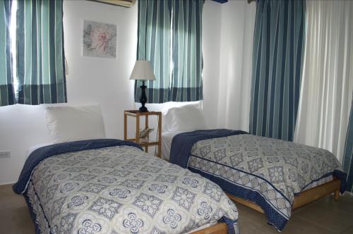 Postel nebo postele na pokoji v ubytování Apartment in Cadaques Caribe