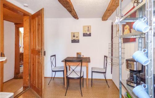a small dining room with a table and chairs at Nice Home In Gottmadingen With Wifi in Gottmadingen