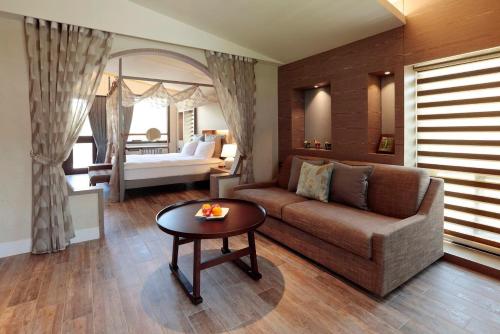 Ein Bett oder Betten in einem Zimmer der Unterkunft 藏青谷 莊園Valley Statt Manor
