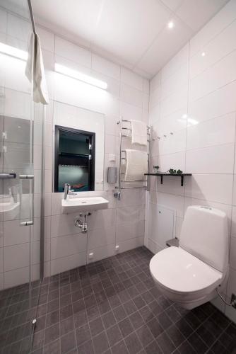 Et badeværelse på Staykvick Boutique Hostel