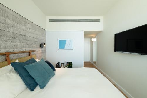Ένα ή περισσότερα κρεβάτια σε δωμάτιο στο Elma Hotel and Art Complex