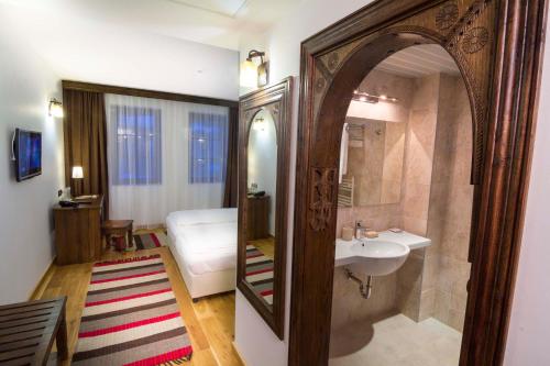 Ванная комната в Arbanashki Han Hotelcomplex