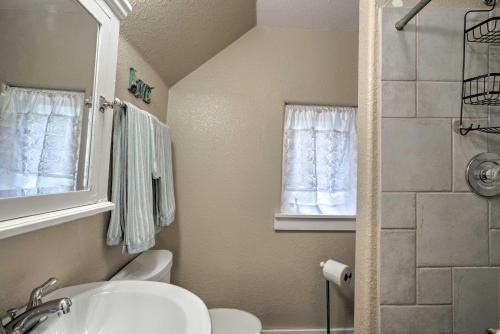a bathroom with a sink and a toilet and a shower at Creekside Home with Patio, Walk to Manitou Incline! in Manitou Springs