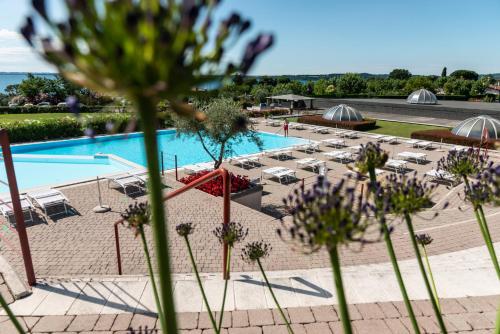 The swimming pool at or close to Relax al Porto - 180 degrees of exciting Garda lake views