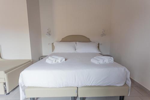 Una cama o camas en una habitación de Albergo Diffuso Amatrice