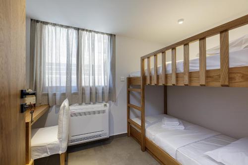 Ένα ή περισσότερα κρεβάτια σε δωμάτιο στο North Coast Seaside Suites