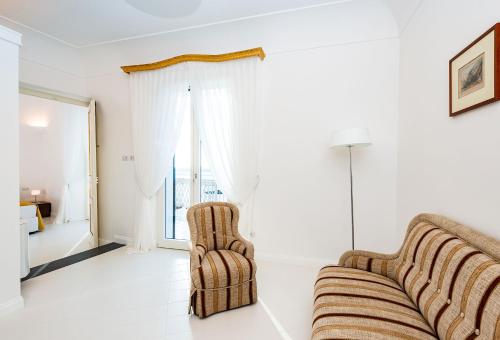 Χώρος καθιστικού στο AMORE RENTALS - Palazzo della Storia