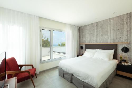 Ένα ή περισσότερα κρεβάτια σε δωμάτιο στο Elma Hotel and Art Complex