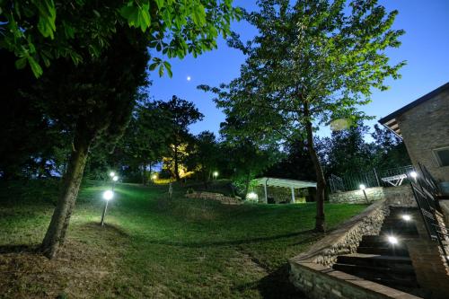 a park at night with lights in the grass at Castello di Marano sul Panaro - Room & Breakfast in Marano sul Panaro