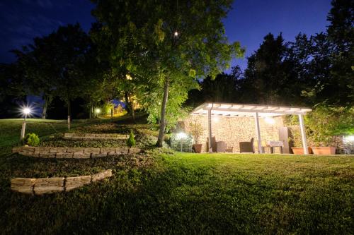 a gazebo in a park at night at Castello di Marano sul Panaro - Room & Breakfast in Marano sul Panaro