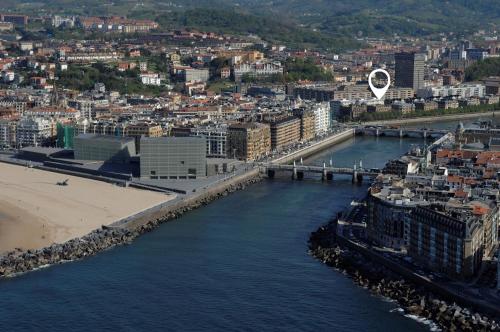 an aerial view of a city next to a body of water at Abba San Sebastián Hotel in Donostia-San Sebastián