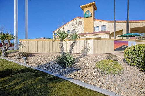 a building with a clock tower on top of it at La Quinta Inn by Wyndham El Paso Cielo Vista in El Paso