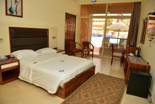 En eller flere senge i et værelse på Jewel Inn Beni Suef