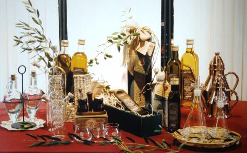 a table with many bottles of wine and glasses at Agriturismo Barbarino in Vinci