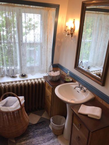 Vonios kambarys apgyvendinimo įstaigoje Chez Odette, suite international