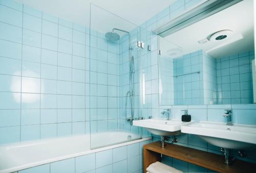 Ванна кімната в Domesi Concept House Pulečný