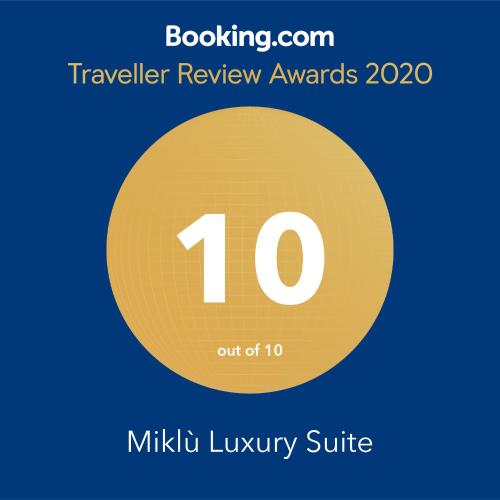 a yellow circle with the number in the middle at Miklù Luxury Suite in Lecce