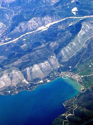 an aerial view of a body of water at Panorama Plataria Ionio Studios&Apartments in Plataria