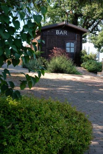 a building with the word bar written on it at Castello di Marano sul Panaro - Room & Breakfast in Marano sul Panaro