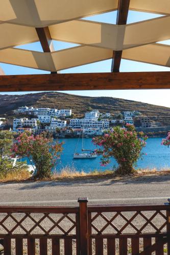 a view of a harbor with a boat in the water at Tzamaros Studios in Mérikhas
