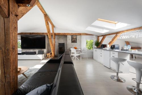 Kuchyňa alebo kuchynka v ubytovaní apartamenty kamienica