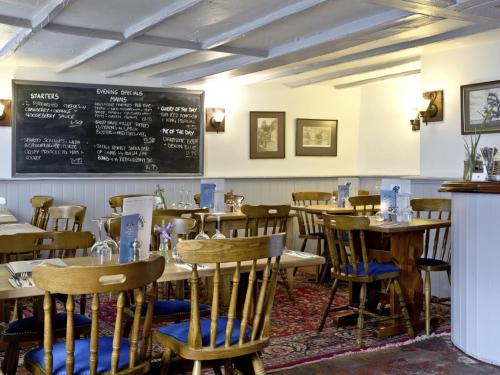 A restaurant or other place to eat at The Fortescue Inn Salcombe