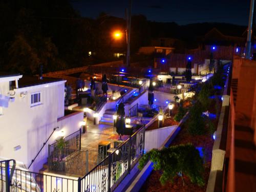 a view of a building at night with lights at The Fountain Inn in Hendy