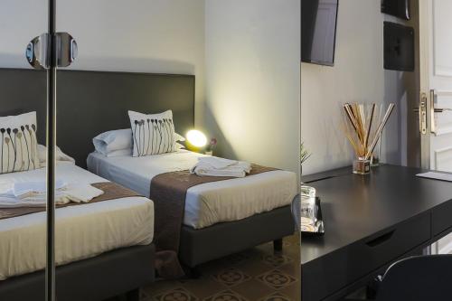Cama o camas de una habitación en Re Vittorio De Luxe