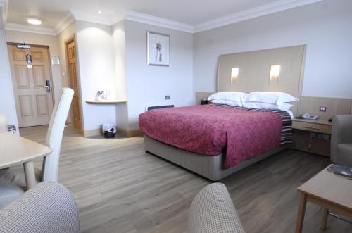 The Mansefield Hotelにあるベッド
