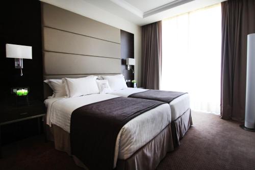 Katil atau katil-katil dalam bilik di BessaHotel Boavista