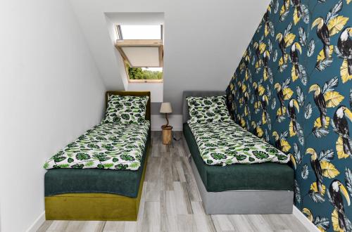 Tempat tidur dalam kamar di Apartament Twoja Przystań